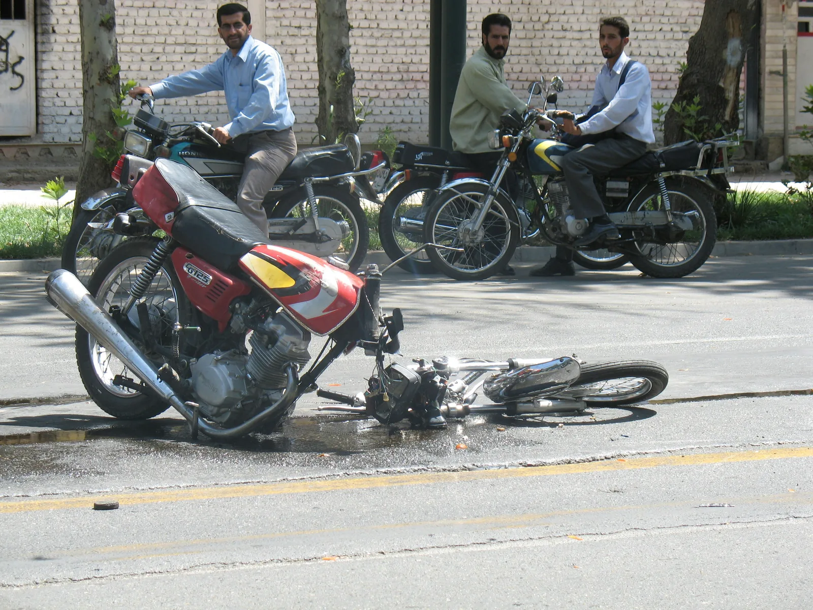 Crashed and it wasn't your fault? — illustrative photo showing a rider and their bike after an incident